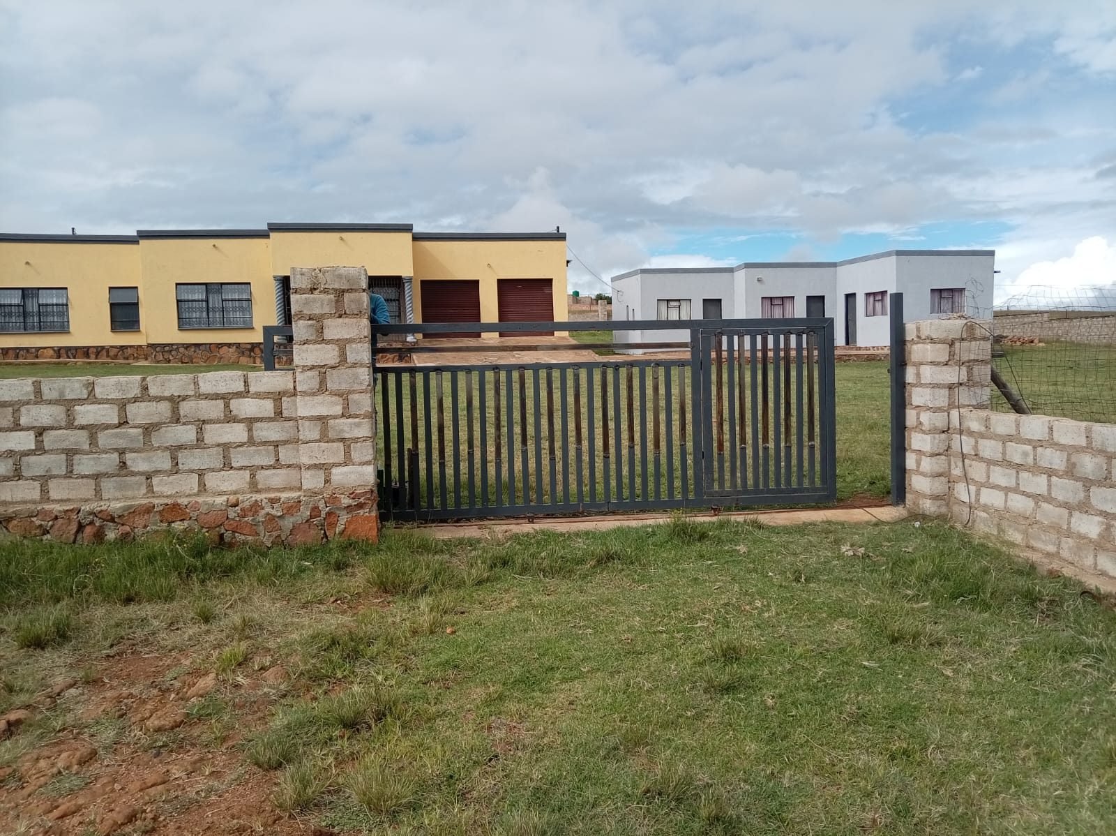 Vertical bar steel gate installed at a home