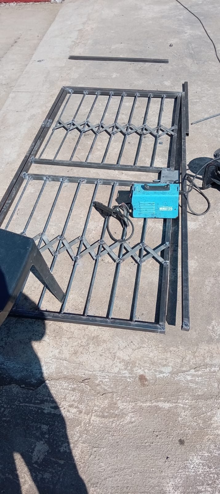 Trellis security gate panels being fabricated in the workshop